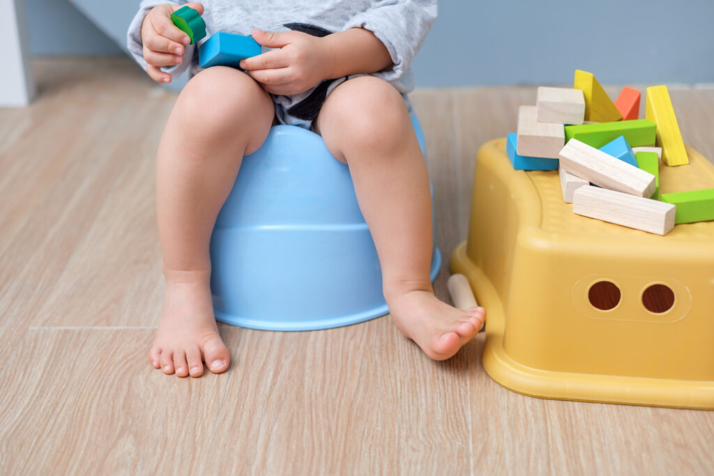 potty training and poop. will pee not poop.